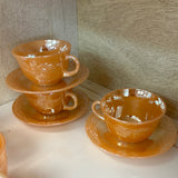 A-2698 Fire King Peach Luster Teacup and Saucer ‘Laurel’